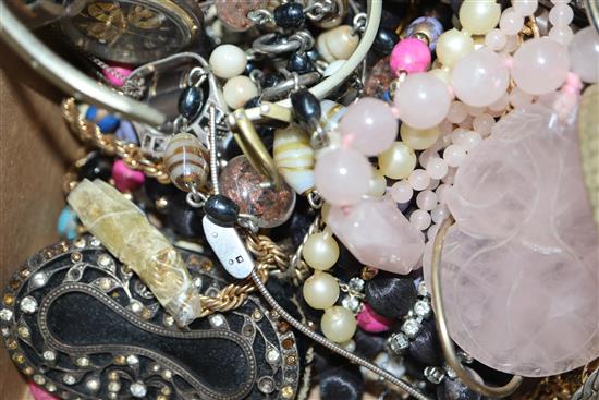 A box of assorted costume jewellery.